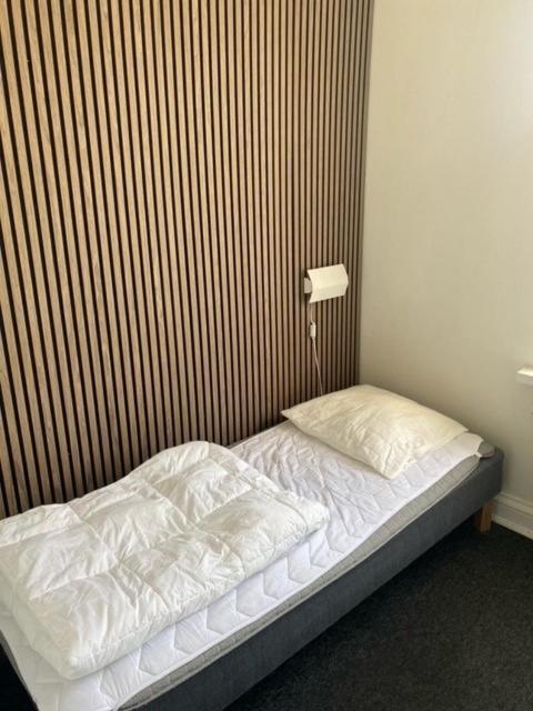 Danhostel Odense City Екстериор снимка A bed with a duvet